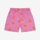 Pink starfish UV protective swim shorts. Pink shorts with a starfish pattern and a rear pocket, against a white background.